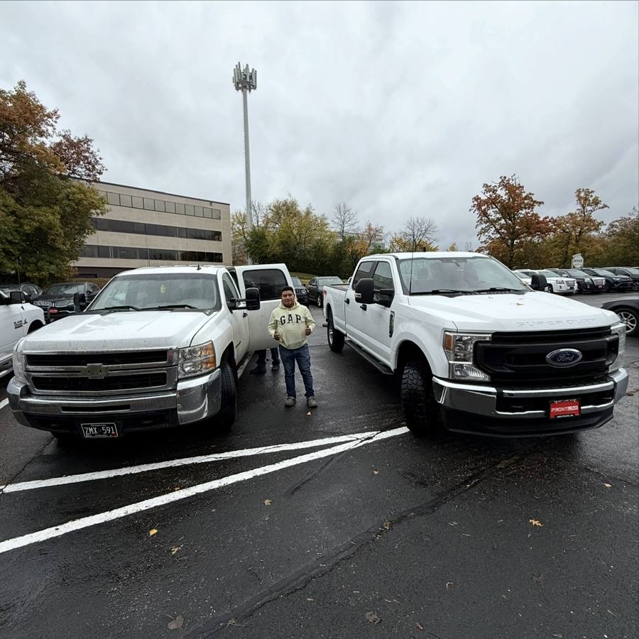 Front Line Auto customer with his trucks