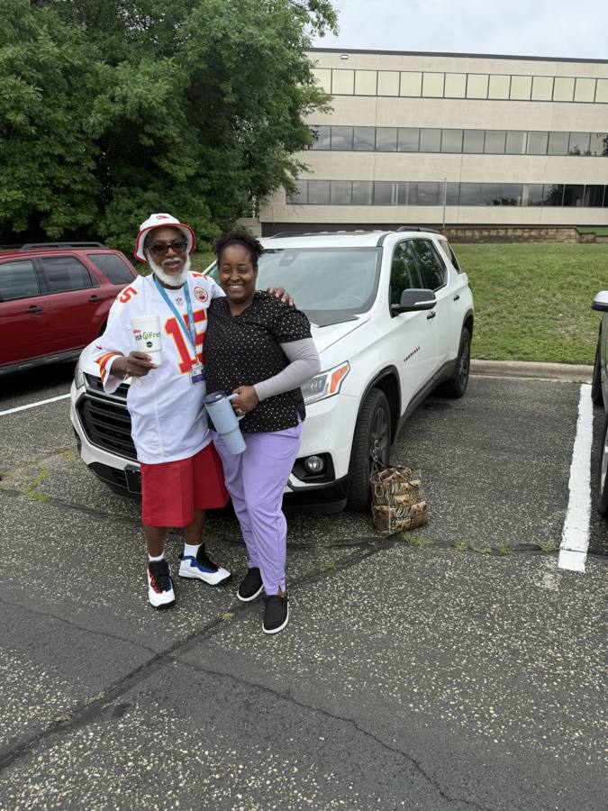 Front Line Auto customers with their Chevy Traverse